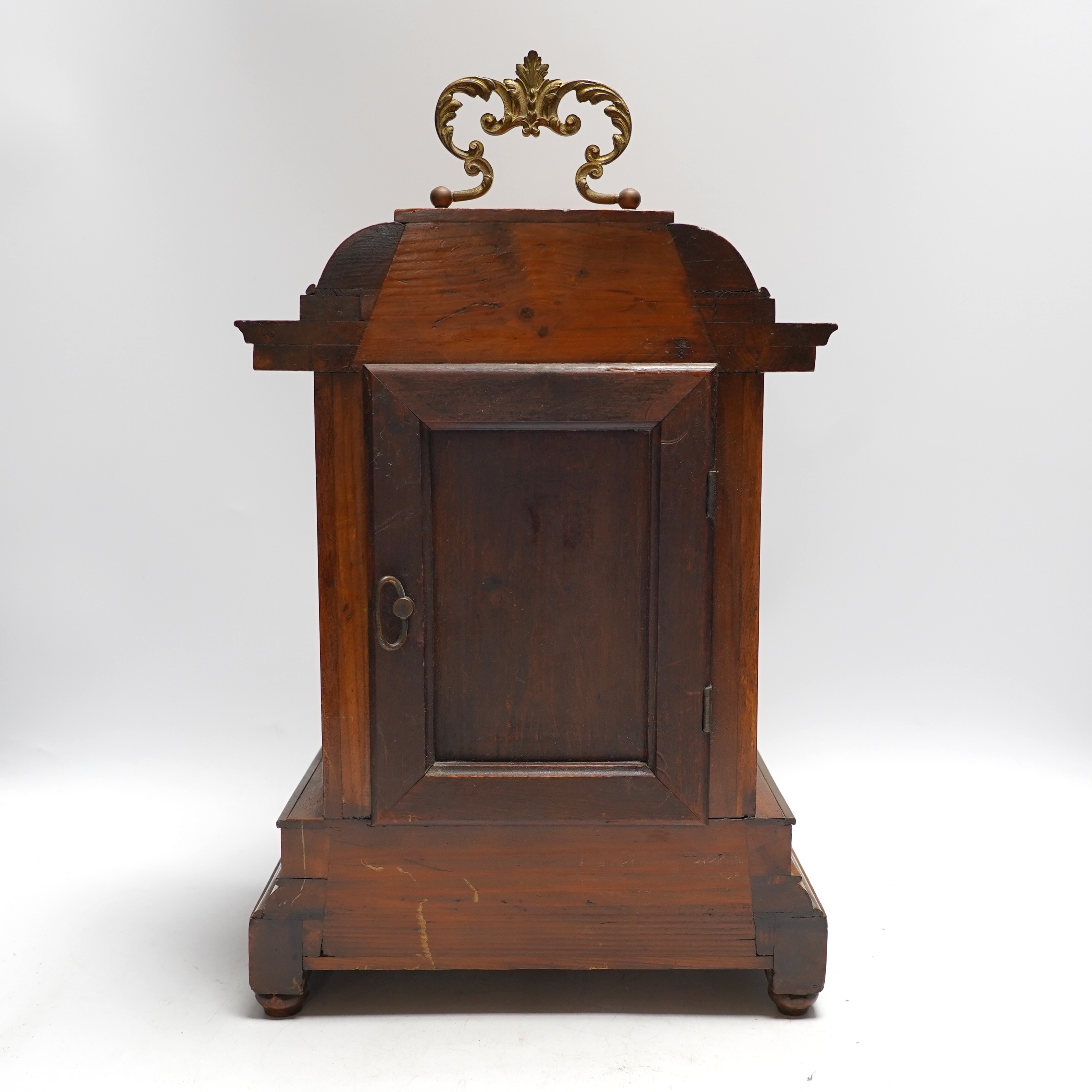 A Black Forest mantel clock with an HAC, Wurttemberg movement, striking on a coiled gong, 35cm high together with an early 20th century inlaid mahogany mantel clock